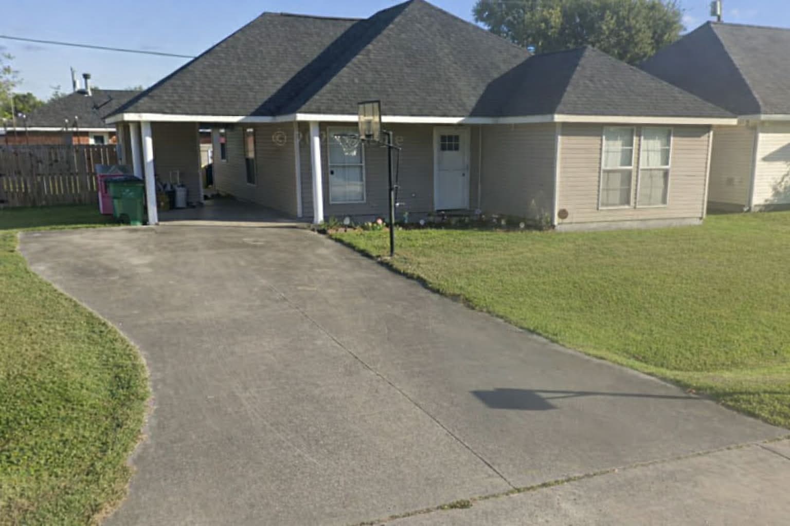 Driveway before pressure washing